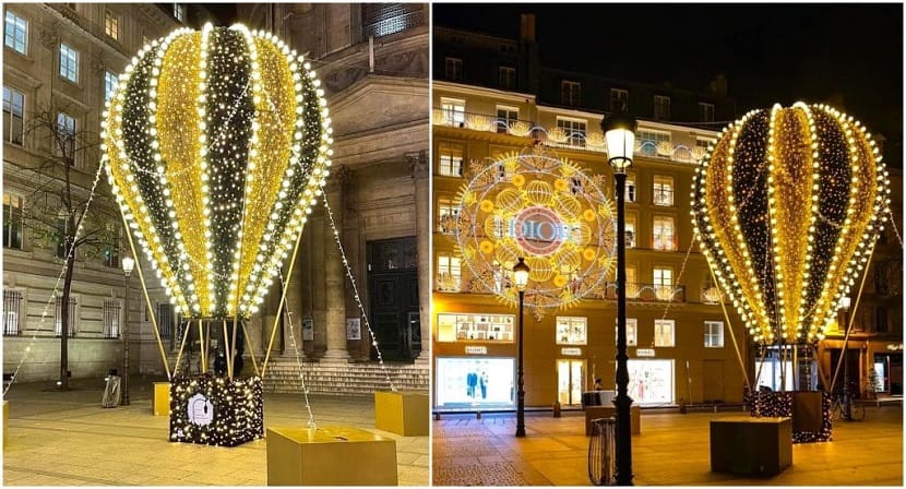 Globo iluminado y decoración navideña en la rue du Faubourg Saint-Honoré de París